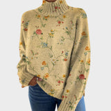 Flavia – Pulover floral cu guler înalt